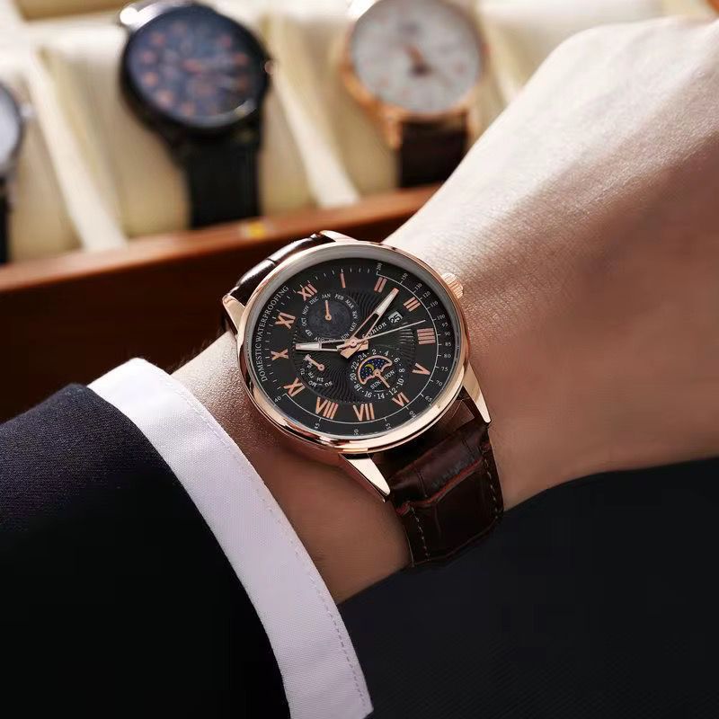 montre pour hommes en cuire avec calendrier à trois yeux ciel étoilé lune